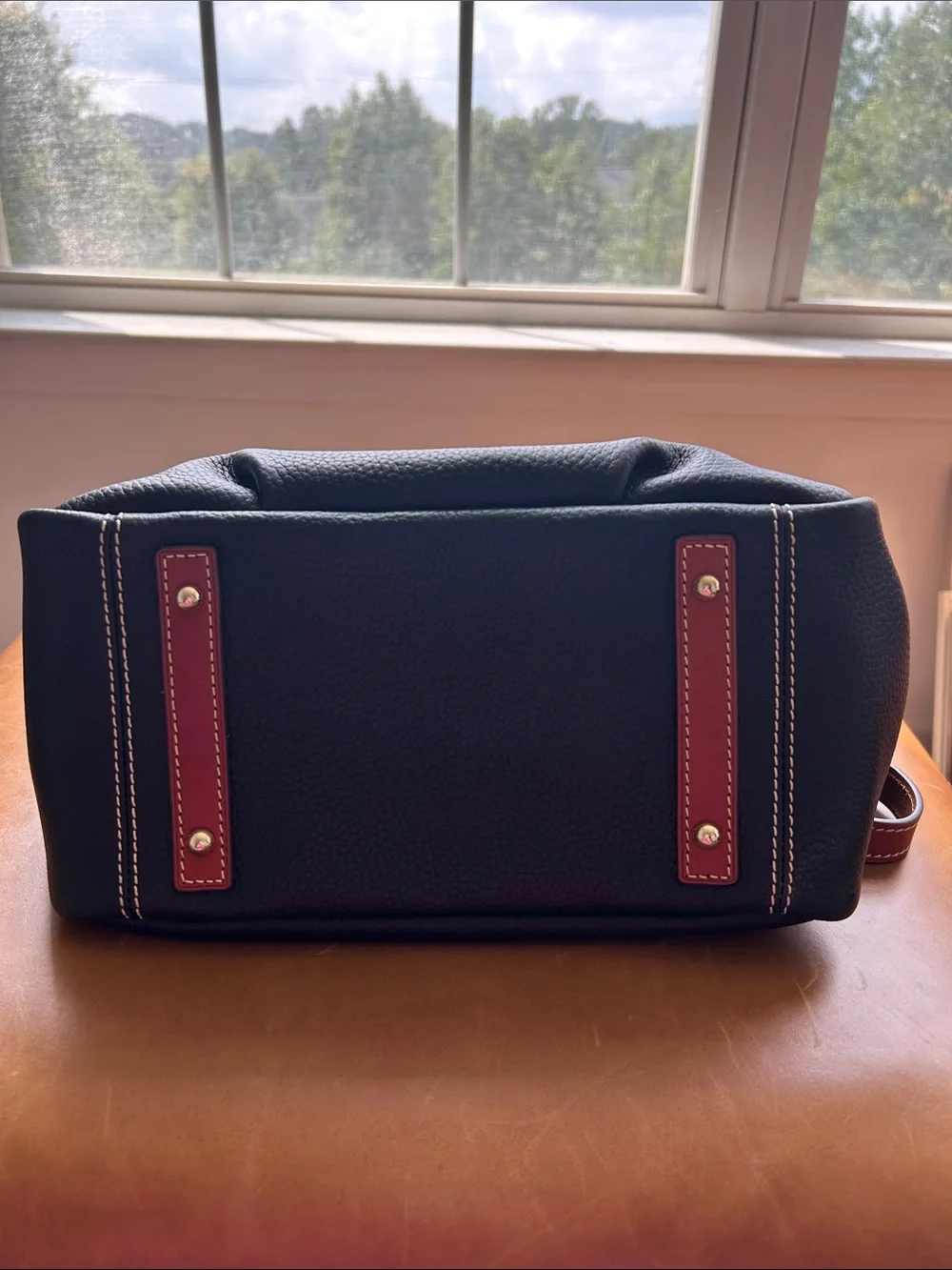 Dooney & Bourke Black Pebble Grain Leather Front Pocket Satchel with Brown Trim